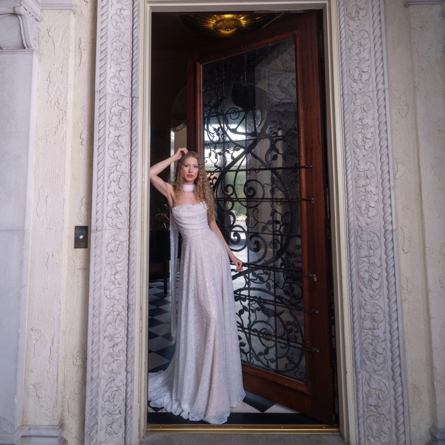 Photo of Model wearing a Willowby Collection Dress