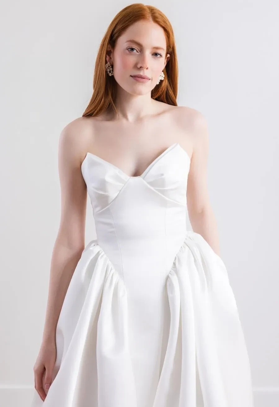 Photo of Model wearing a Willowby Collection Dress